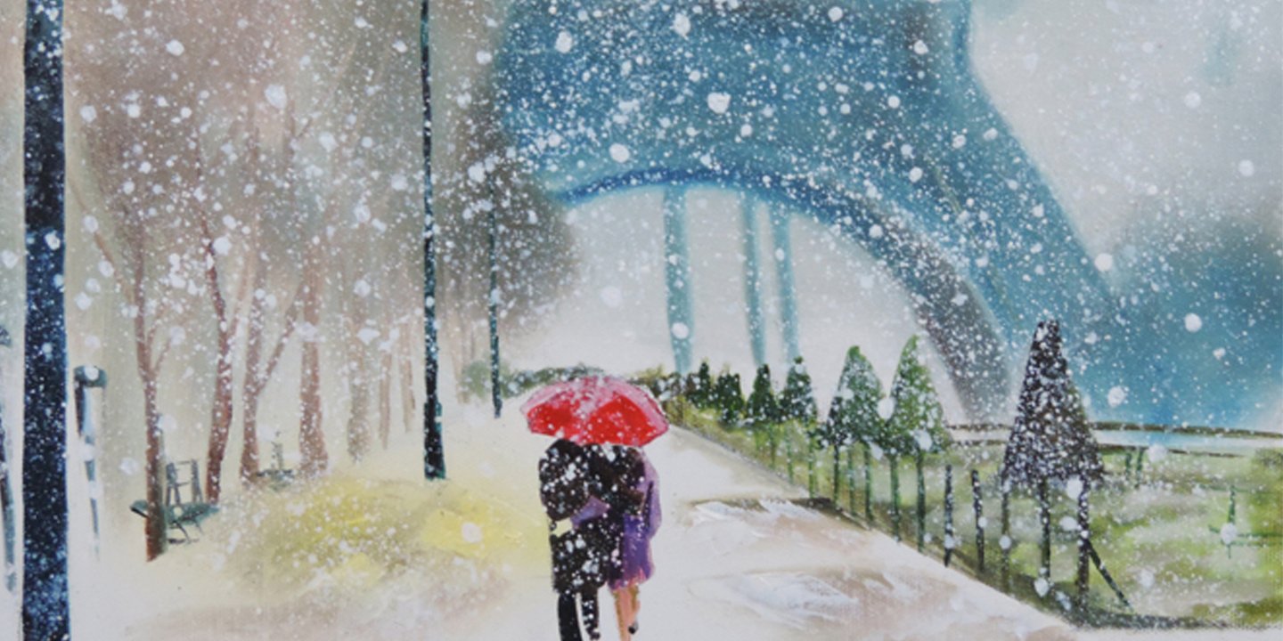 a couple walking in the snow near the effiel tower