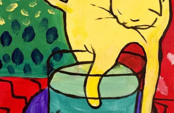 yellow cat with fish bowl